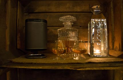 Relax with soft candle lighting, a warming tumbler of Whiskey and great music playing on the Sonos